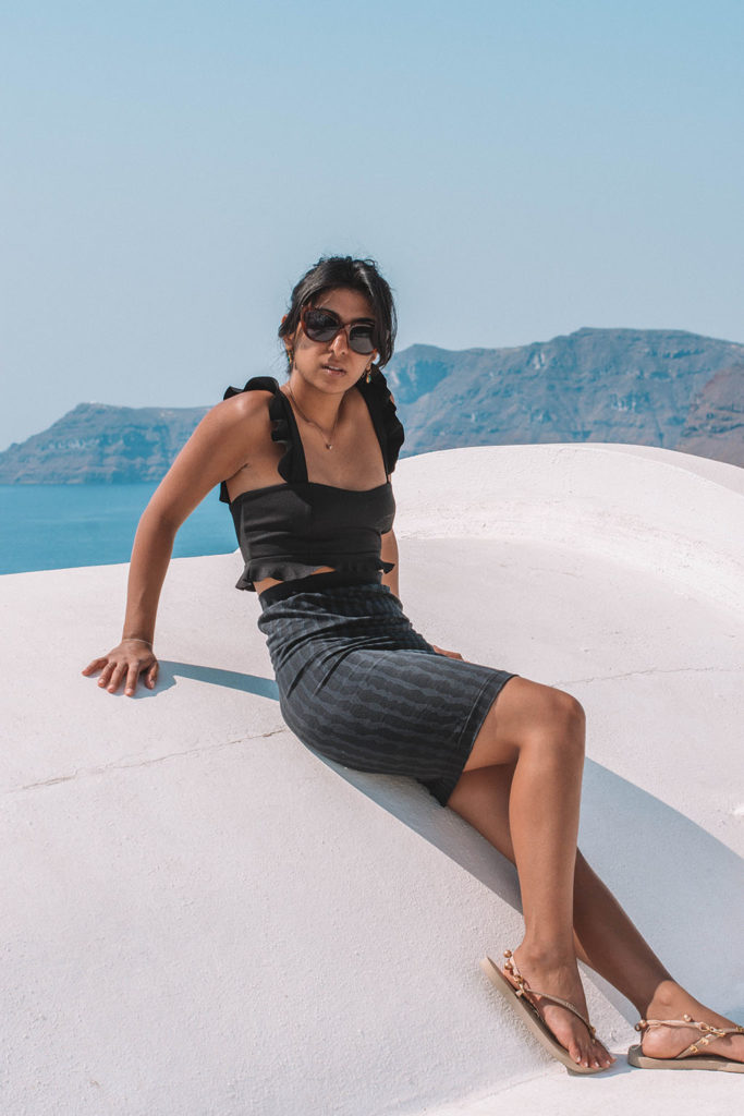 Fashion blogger Shloka Narang of The Silk Sneaker showcases how to look glamorous on your holiday with Wolford in Santorini