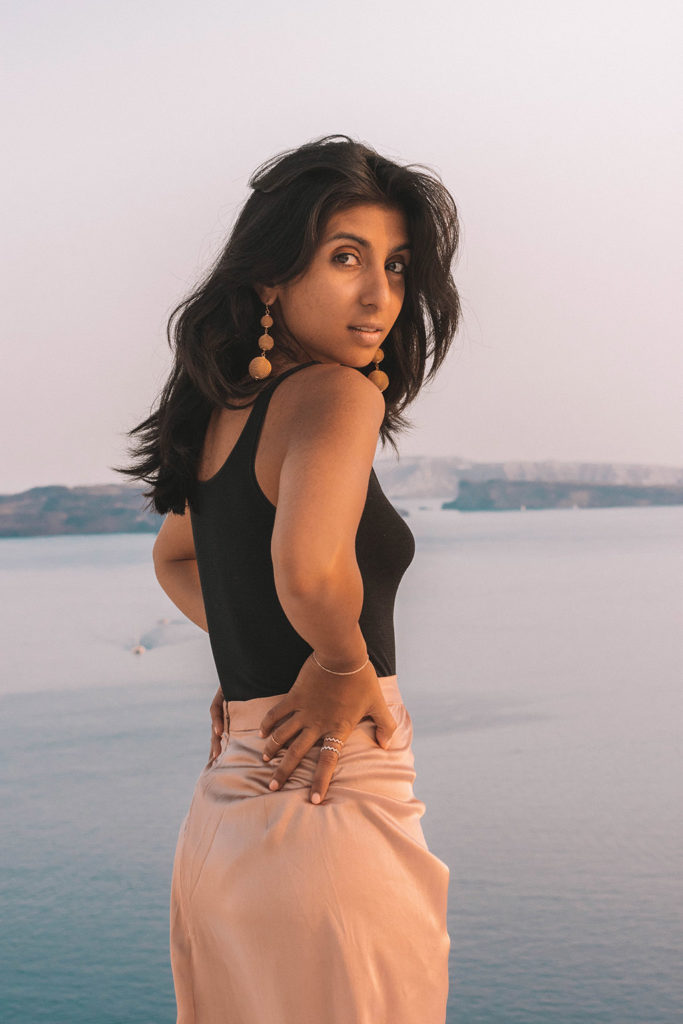Fashion blogger Shloka Narang of The Silk Sneaker showcases how to look glamorous on your holiday with Wolford in Santorini