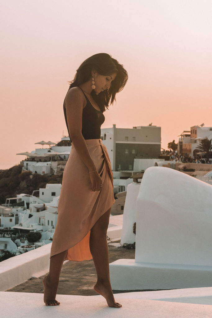 Fashion blogger Shloka Narang of The Silk Sneaker showcases how to look glamorous on your holiday with Wolford in Santorini