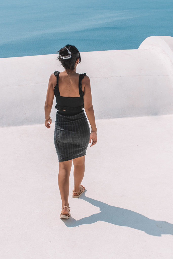 Fashion blogger Shloka Narang of The Silk Sneaker showcases how to look glamorous on your holiday with Wolford in Santorini