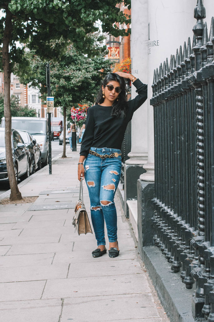 Fashion blogger Shloka Narang of The Silk Sneaker showcases the best top you need for summer to autumn transitional dressing in ba&sh