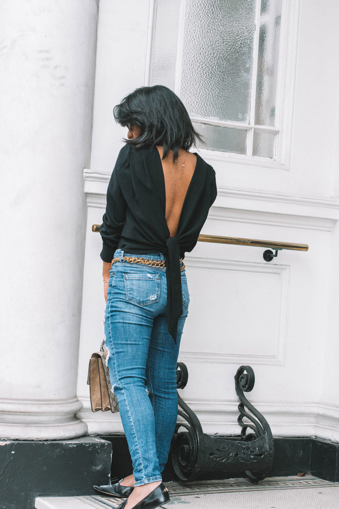 Fashion blogger Shloka Narang of The Silk Sneaker showcases the best top you need for summer to autumn transitional dressing in ba&sh