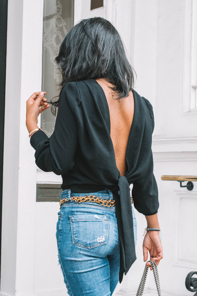 Fashion blogger Shloka Narang of The Silk Sneaker showcases the best top you need for summer to autumn transitional dressing in ba&sh