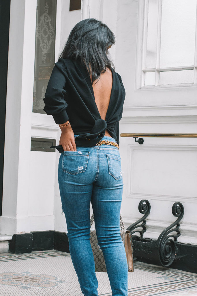 Fashion blogger Shloka Narang of The Silk Sneaker showcases the best top you need for summer to autumn transitional dressing in ba&sh