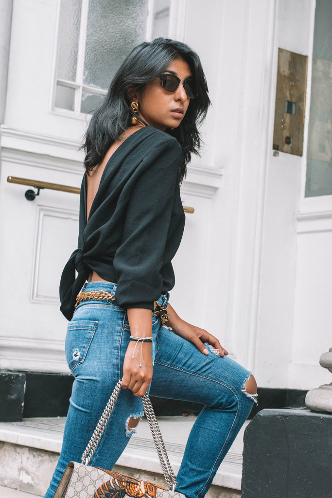 Fashion blogger Shloka Narang of The Silk Sneaker showcases the best top you need for summer to autumn transitional dressing in ba&sh