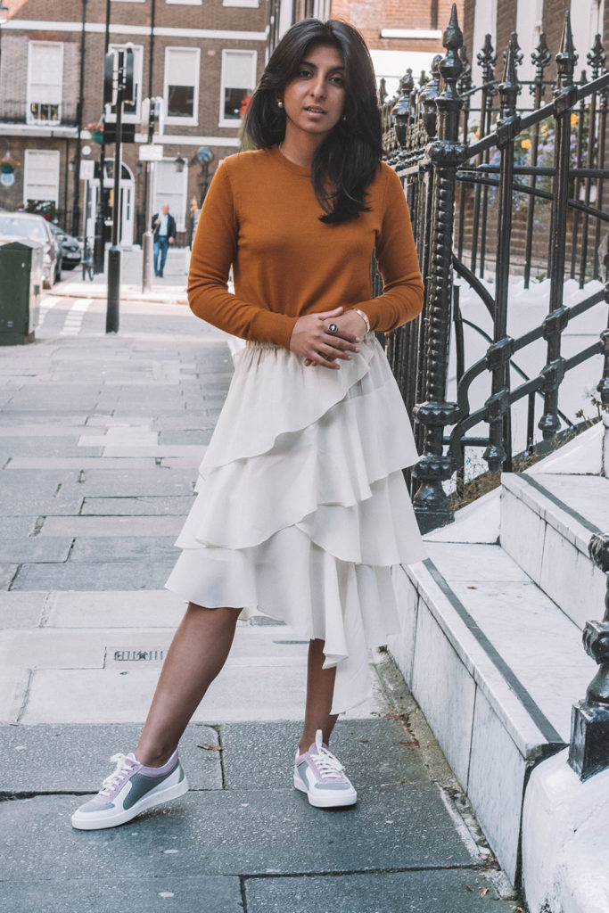 Fashion blogger Shloka Narang of the Silk Sneakers create a stunning fall outfit transitioning the summer skirt in autumn with Isabel Marant Etoile, Uniqlo and Amazon Find