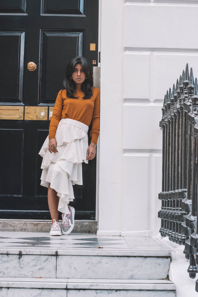 Fashion blogger Shloka Narang of The Silk Sneaker creates a stunning autumn outfit transitioning the summer skirt into autumn with Isabel Marant, Uniqlo and Amazon Find