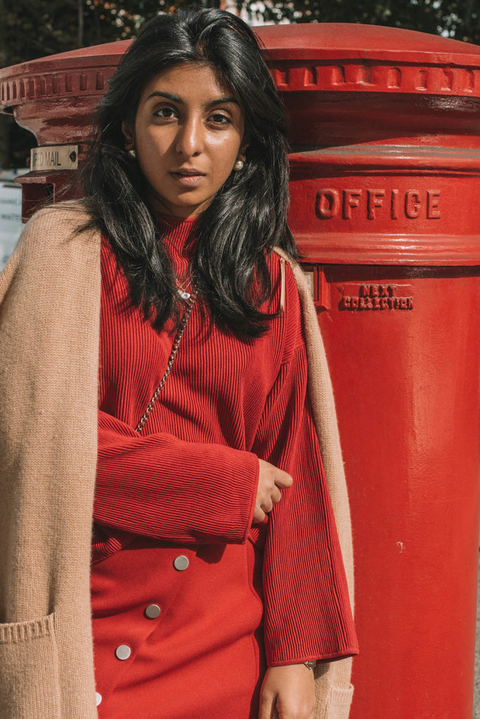 Fashion Blogger Shloka Narang of The Silk Sneaker creates a fabulous red outfit showing you how to wear monochrome outfits this fall