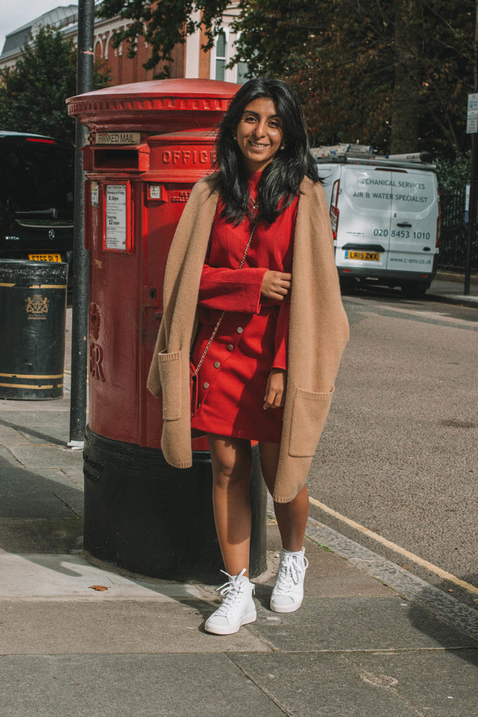 Fashion Blogger Shloka Narang of The Silk Sneaker creates a fabulous red outfit showing you how to wear monochrome outfits this fall