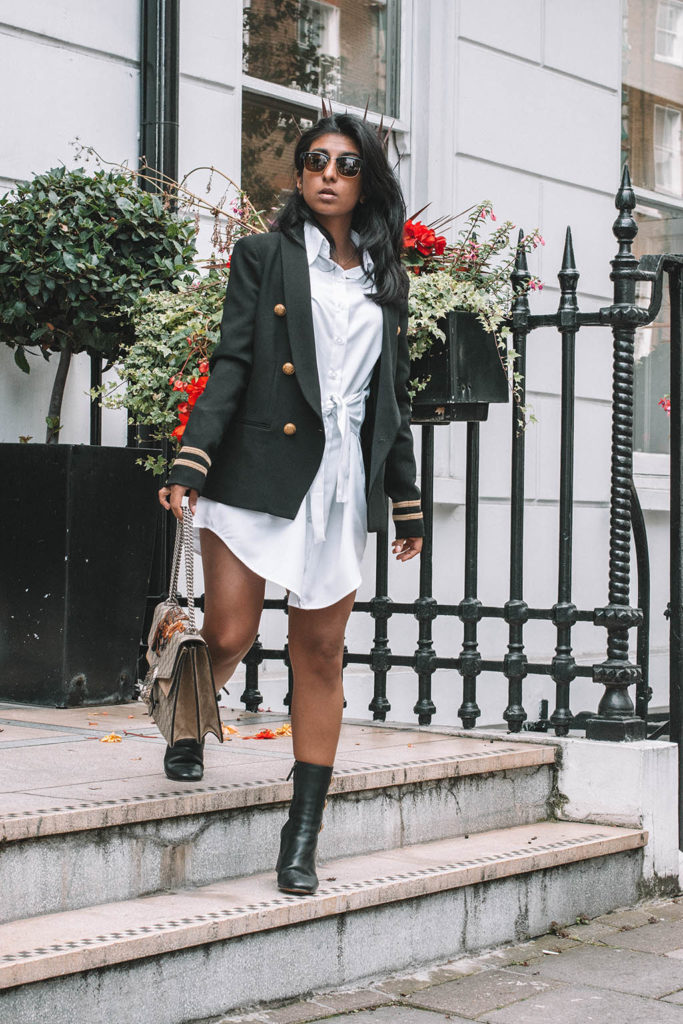 Fashion blogger Shloka Narang of The Silk sneaker showcases how to style a shirt dress for the autumn