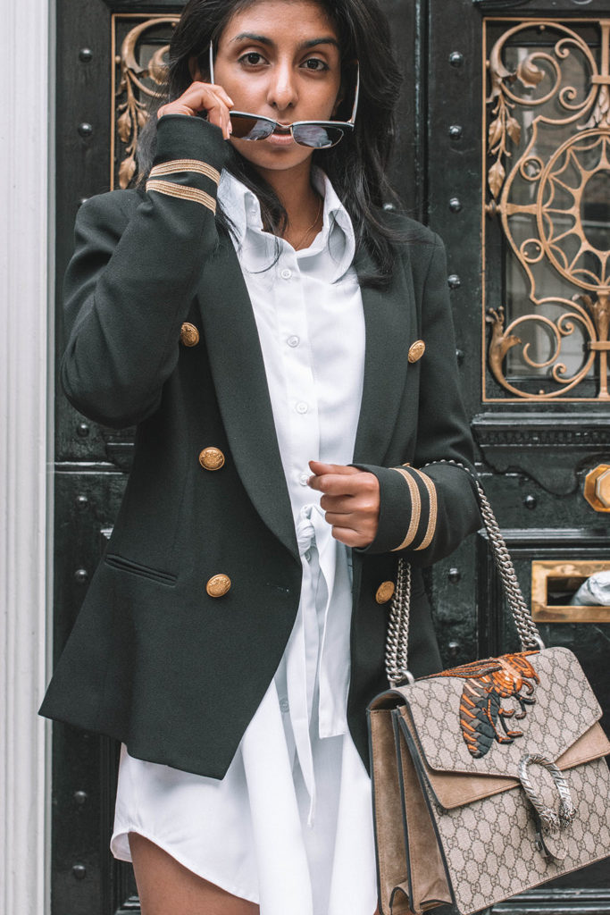 Fashion blogger Shloka Narang of The Silk sneaker showcases how to style a shirt dress for the autumn