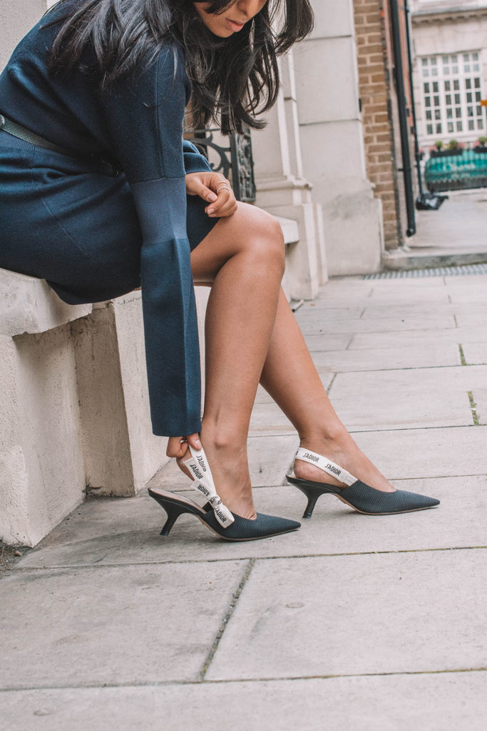 Fashion blogger Shloka Narang of The Silk Sneaker showcases how to wear a dress as an autumn fashion outfit idea