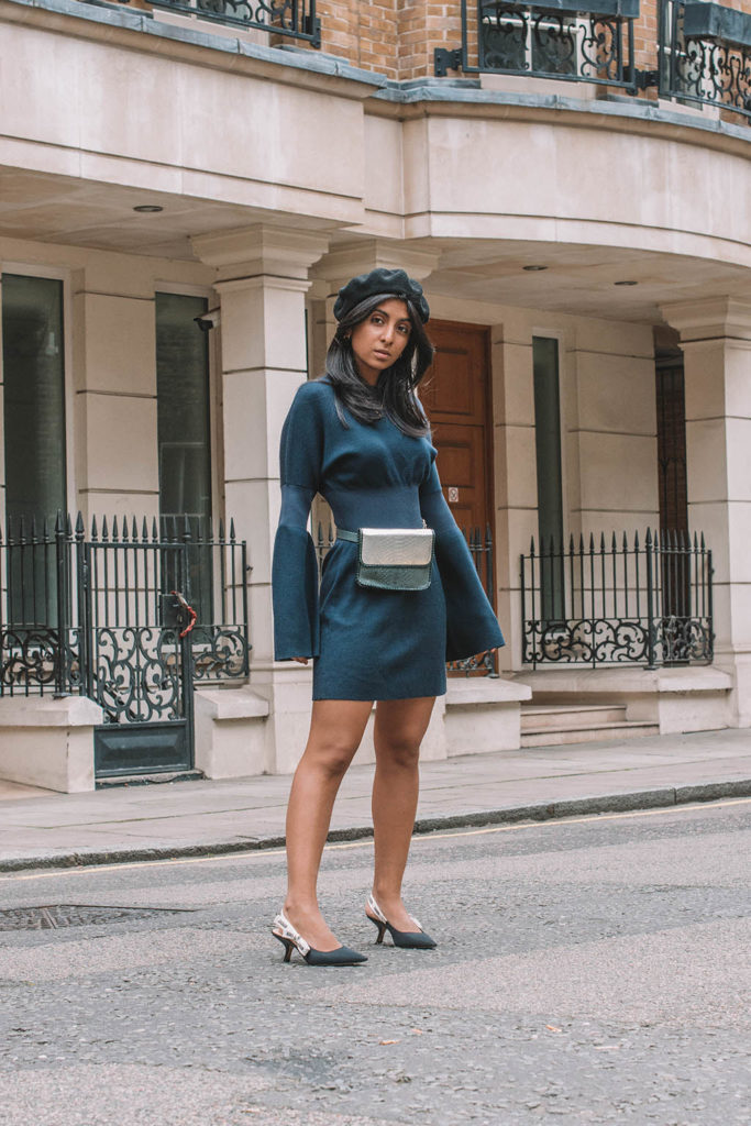 Fashion blogger Shloka Narang of The Silk Sneaker showcases how to wear a dress as an autumn fashion outfit idea