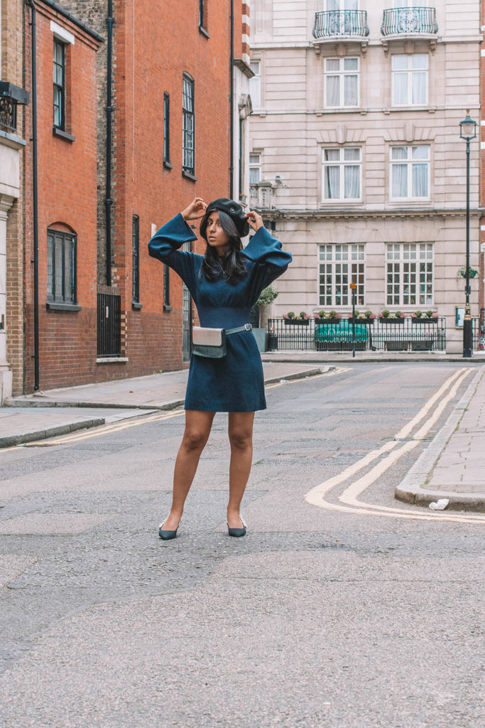 Fashion blogger Shloka Narang of The Silk Sneaker showcases how to wear a dress as an autumn fashion outfit idea