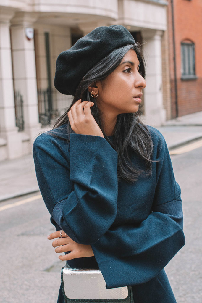 Fashion blogger Shloka Narang of The Silk Sneaker showcases how to wear a dress as an autumn fashion outfit idea