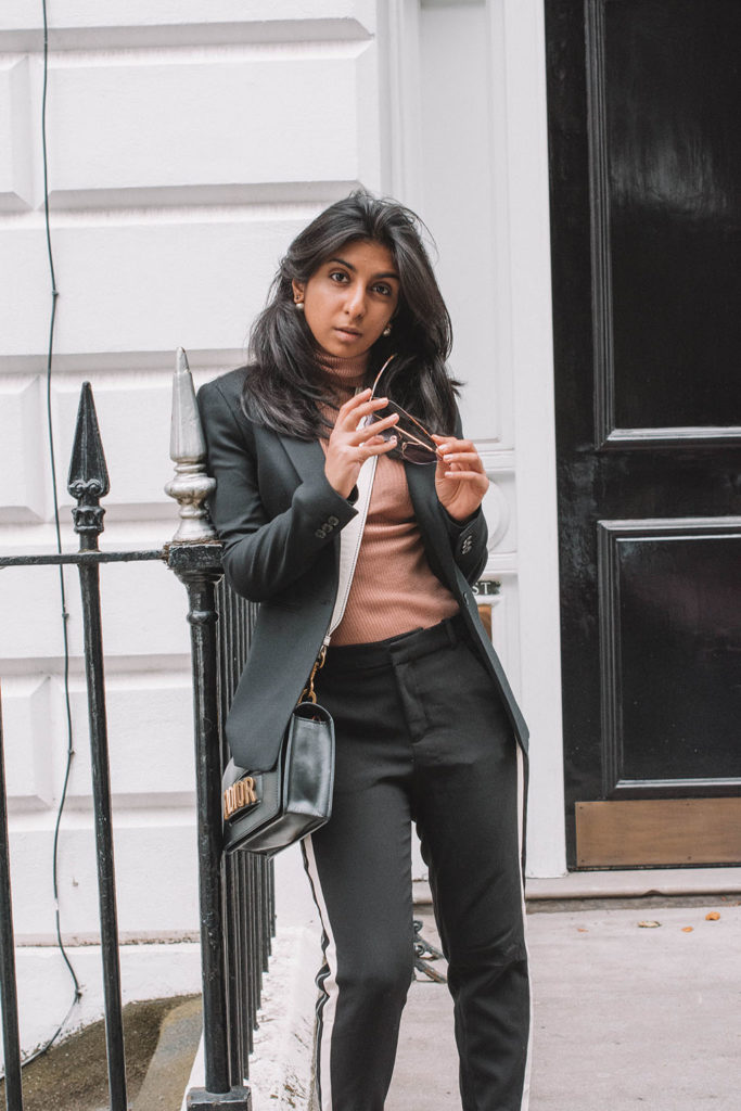 Fashion blogger Shloka Narang of The Silk Sneaker creates a fashionable weekend outfit with your favourite black blazer