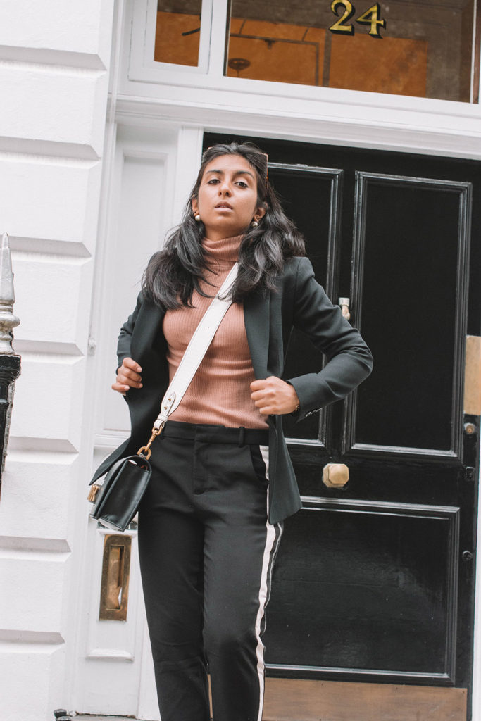 Fashion blogger Shloka Narang of The Silk Sneaker creates a fashionable weekend outfit with your favourite black blazer