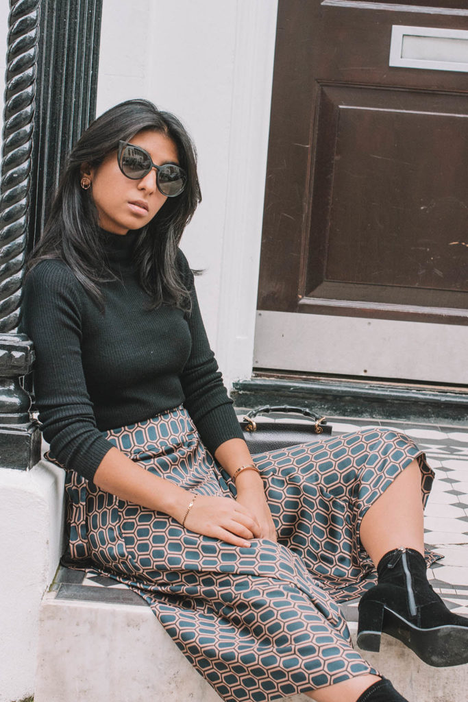 Fashion blogger Shloka Narang of The Silk Sneaker shares her favourite new Zara find and how to style a midi skirt for autumn