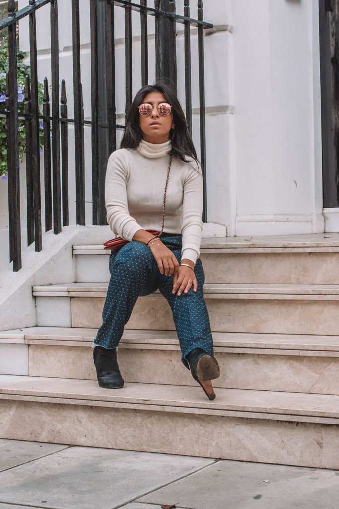 Fashion blogger Shloka Narang of The Silk Sneaker creates a gorgeous outfit to elevate a jeans and sweater combo for everyday!