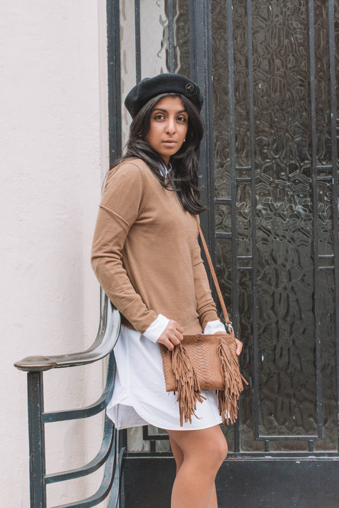Fashion blogger Shloka Narang of The Silk Sneaker shares a fashionable way to wear your favourite white shirt dress in the autumn with this transitional outfit
