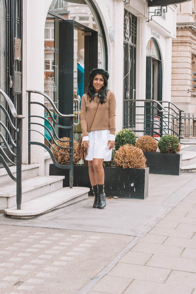 Fashion blogger Shloka Narang of The Silk Sneaker shares a fashionable way to wear your favourite white shirt dress in the autumn with this transitional outfit