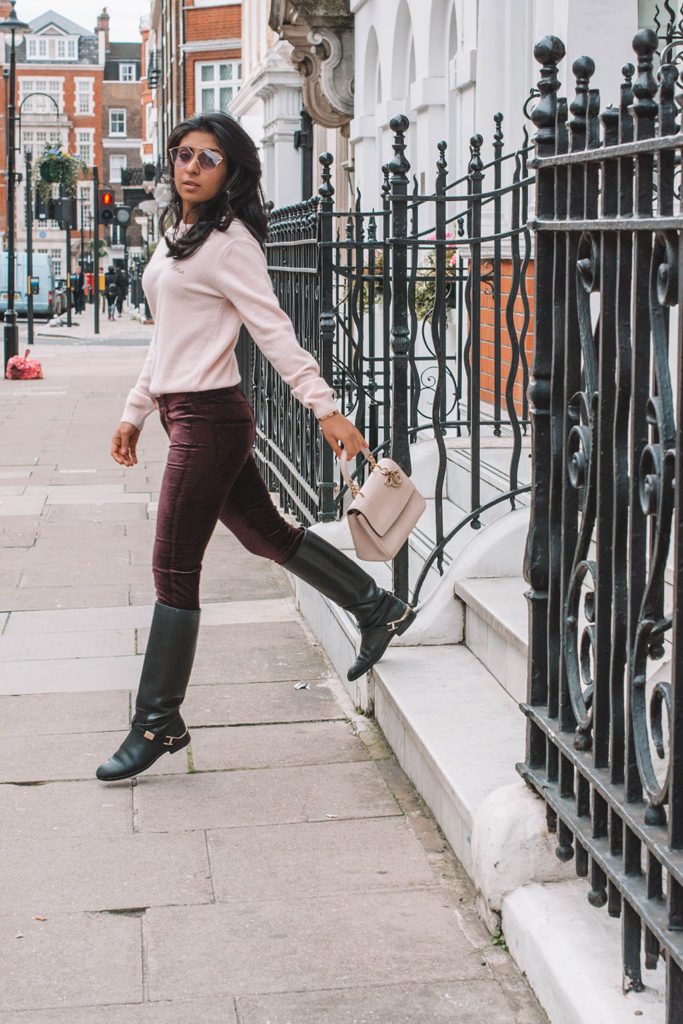 Fashion blogger Shloka Narang of The Silk Sneaker showcases how to style velvet pants in a winter outfit with Paige and Dior