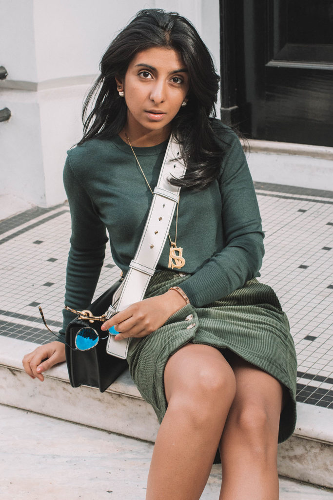 Fashion blogger Shloka Narang of The Silk Sneaker shares her favourite new corduroy skirt outfit featuring Uniqlo and Dior