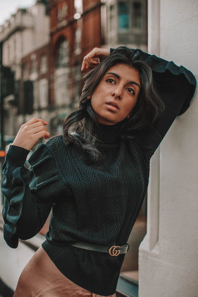 Fashion blogger Shloka Narang of The Silk Sneaker showcases how to wear a summer skirt in winter