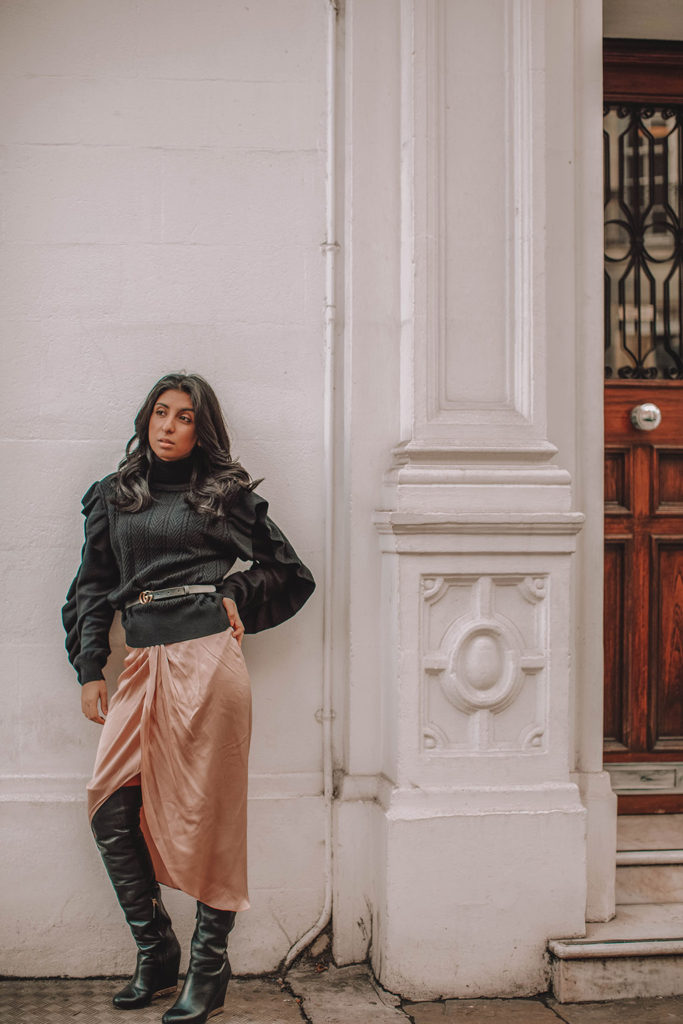 Fashion blogger Shloka Narang of The Silk Sneaker showcases how to wear a summer skirt in winter