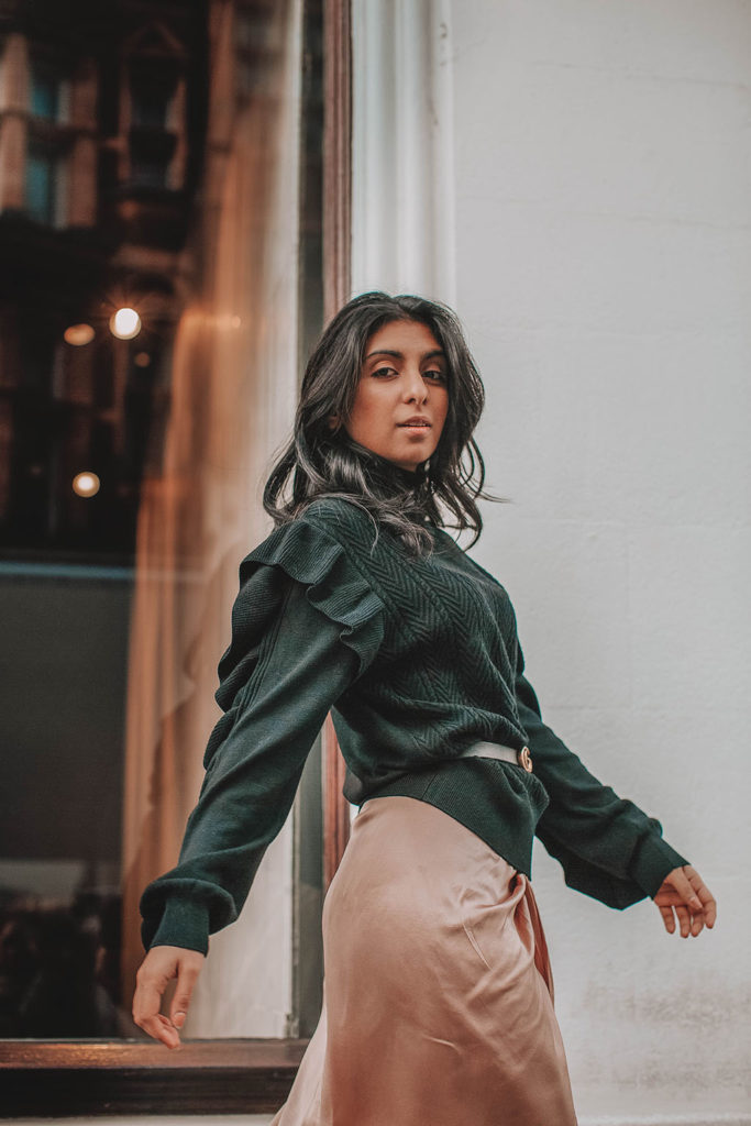 Fashion blogger Shloka Narang of The Silk Sneaker showcases how to wear a summer skirt in winter