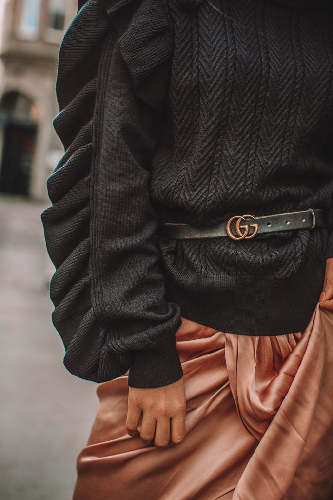 Fashion blogger Shloka Narang of The Silk Sneaker showcases how to wear a summer skirt in winter