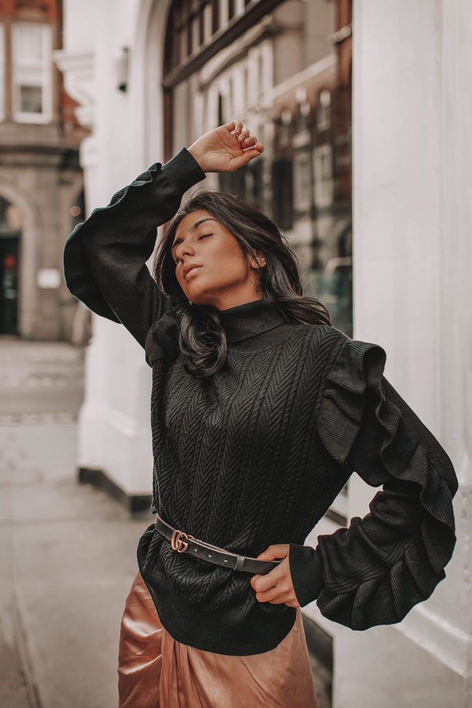Fashion blogger Shloka Narang of The Silk Sneaker showcases how to wear a summer skirt in winter