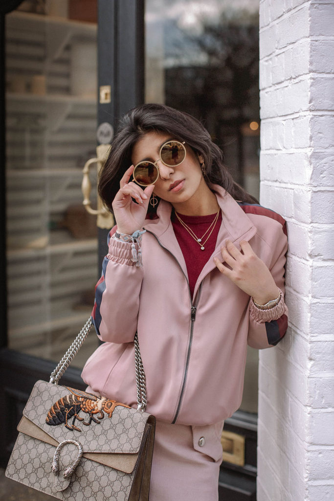 Fashion blogger Shloka Narang of The Silk Sneaker shares how to style the bomber jacket for 2018 featuring Topshop, Maje and Gucci