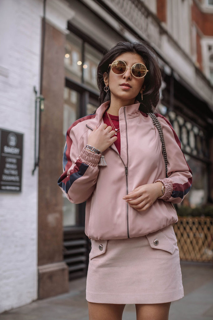 Fashion blogger Shloka Narang of The Silk Sneaker shares how to style the bomber jacket for 2018 featuring Topshop, Maje and Gucci