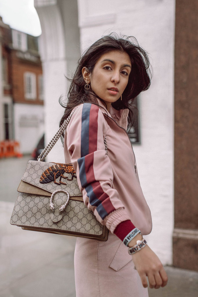Fashion blogger Shloka Narang of The Silk Sneaker shares how to style the bomber jacket for 2018 featuring Topshop, Maje and Gucci
