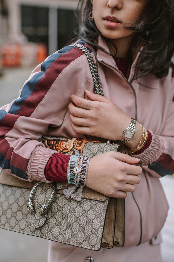 Fashion blogger Shloka Narang of The Silk Sneaker shares how to style the bomber jacket for 2018 featuring Topshop, Maje and Gucci