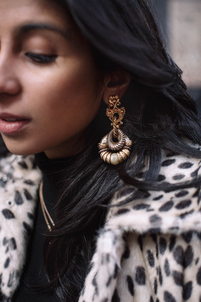 Fashion blogger Shloka Narang of The Silk Sneaker shares how to style a leopard print coat featuring By Malene Birger, Maje and Chanel