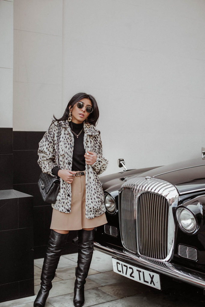 Fashion blogger Shloka Narang of The Silk Sneaker shares how to style a leopard print coat featuring By Malene Birger, Maje and Chanel