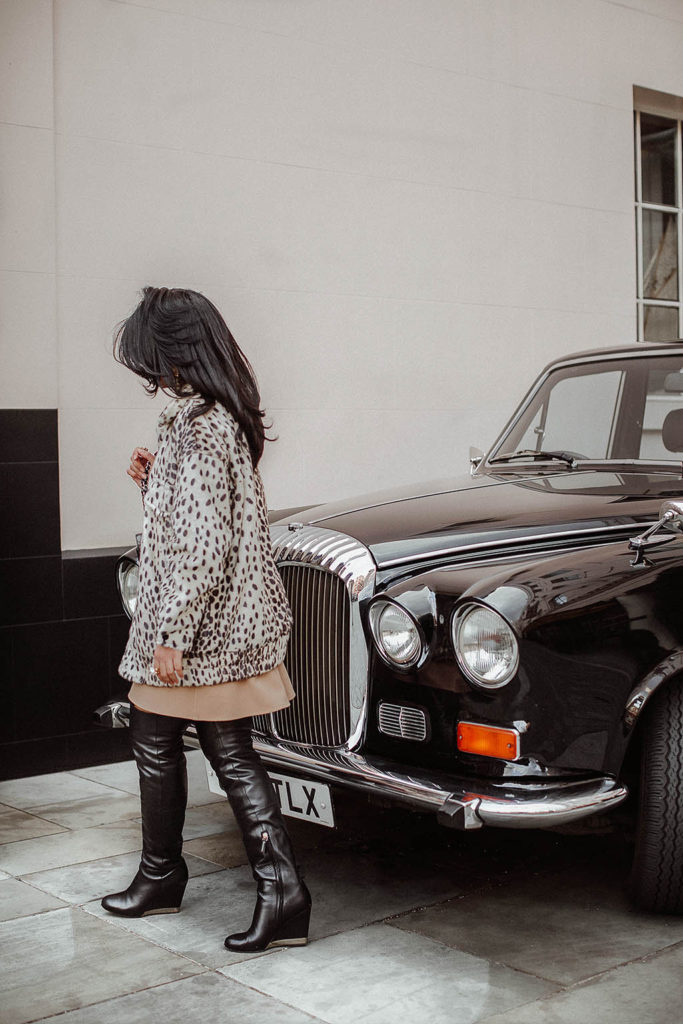 Fashion blogger Shloka Narang of The Silk Sneaker shares how to style a leopard print coat featuring By Malene Birger, Maje and Chanel