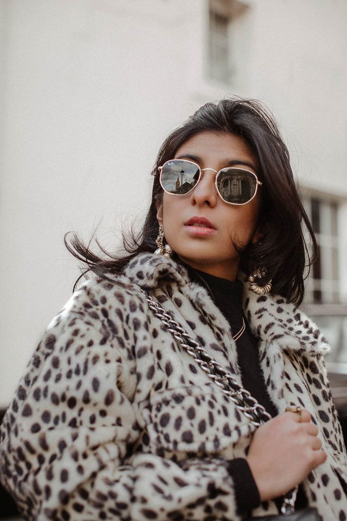 Fashion blogger Shloka Narang of The Silk Sneaker shares how to style a leopard print coat featuring By Malene Birger, Maje and Chanel