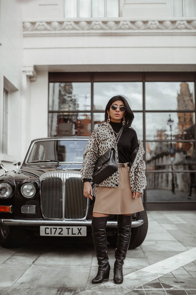 Fashion blogger Shloka Narang of The Silk Sneaker shares how to style a leopard print coat featuring By Malene Birger, Maje and Chanel