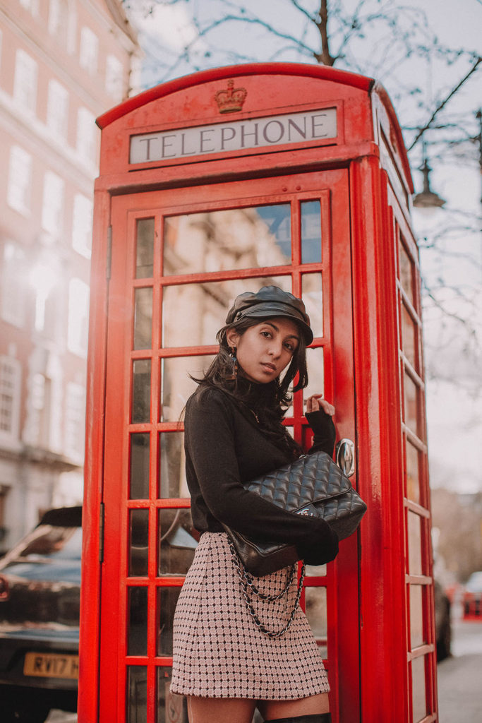 Fashion blogger Shloka Narang of The Silk Sneaker showcases a spring outfit idea with a tweed skirt from Topshop