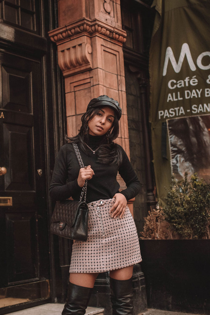 Fashion blogger Shloka Narang of The Silk Sneaker showcases a spring outfit idea with a tweed skirt from Topshop