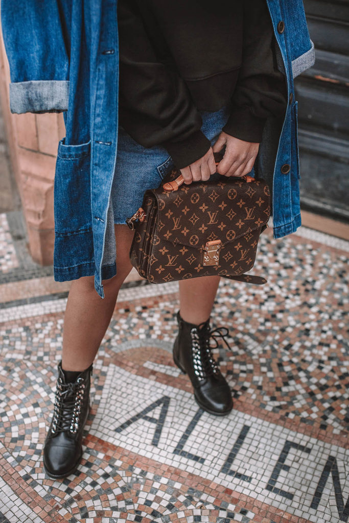 Fashion blogger Shloka Narang of The Silk Sneaker shares how to wear denim on denim for a double denim spring outfit featuring Louis Vuitton and Markus Lupfer