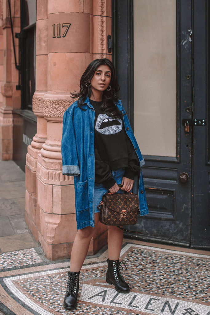 Fashion blogger Shloka Narang of The Silk Sneaker shares how to wear denim on denim for a double denim spring outfit featuring Louis Vuitton and Markus Lupfer