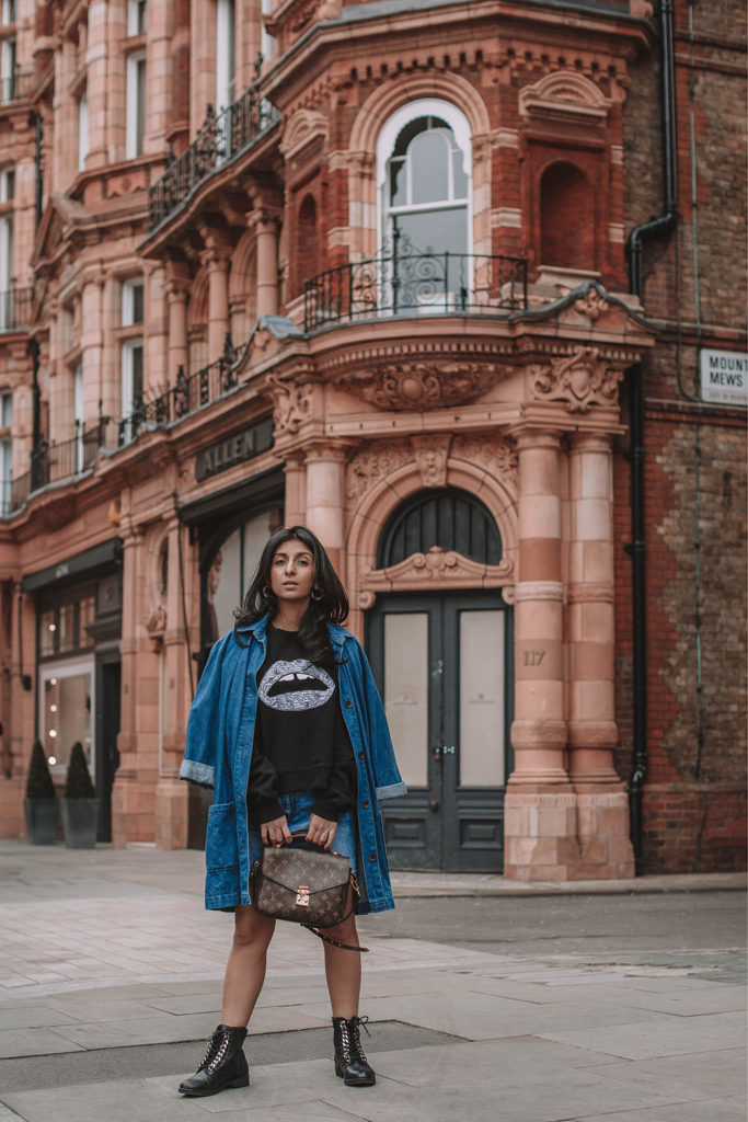 Fashion blogger Shloka Narang of The Silk Sneaker shares how to wear denim on denim for a double denim spring outfit featuring Louis Vuitton and Markus Lupfer