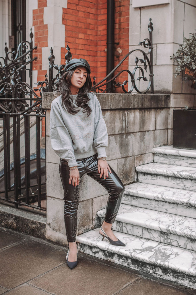 Fashion blogger Shloka Narang of The Silk Sneaker shares how to style a vinyl trousers outfit for the perfect spring outfit idea featuring Isabel Marant Etoile, Dior and Topshop