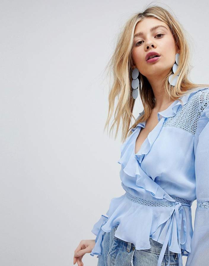 Fashion blogger Shloka Narang from The Silk Sneaker shares her five favourite summer blouses under £50 including ASOS, Topshop and more
