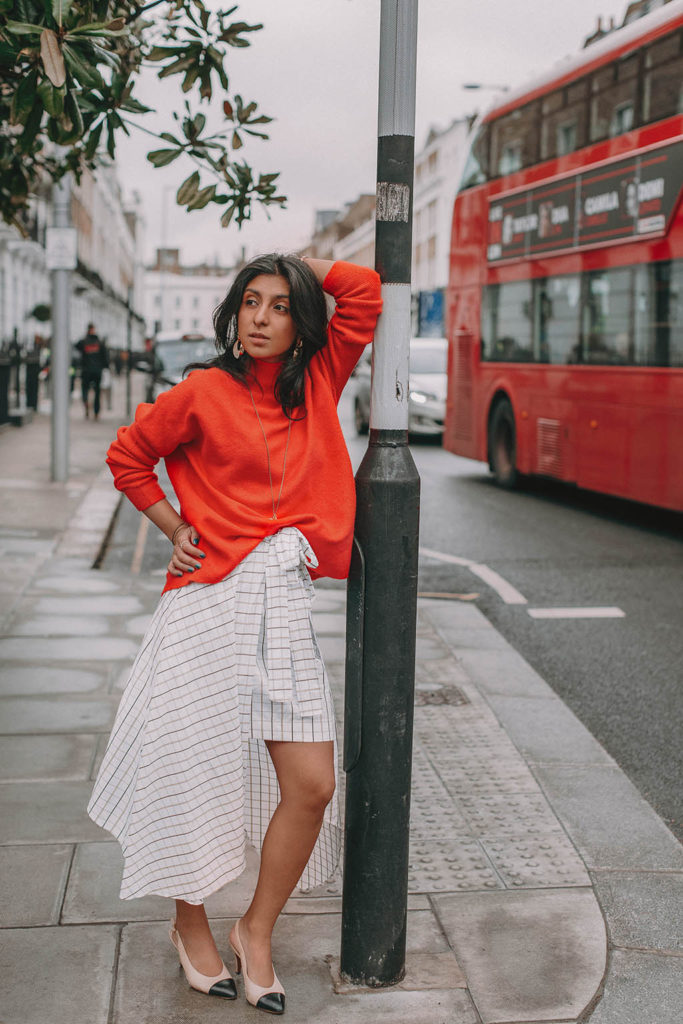 Fashion blogger Shloka Narang of The Silk Sneaker shares how to create the perfect spring outfit while styling an asymmetrical skirt featuring Deme by Gabriella, Chanel and Amazon Fashion