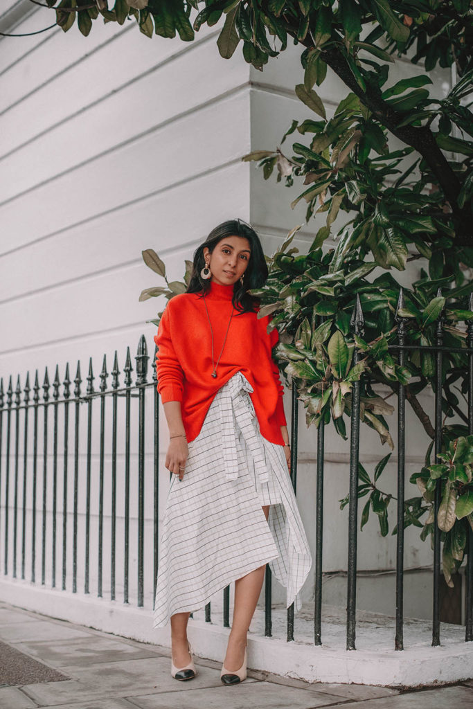 Fashion blogger Shloka Narang of The Silk Sneaker shares how to create the perfect spring outfit while styling an asymmetrical skirt featuring Deme by Gabriella, Chanel and Amazon Fashion